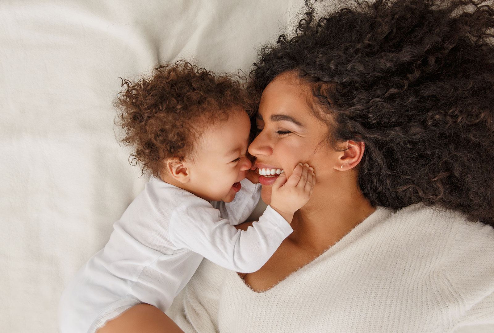 Mom and baby in the bed