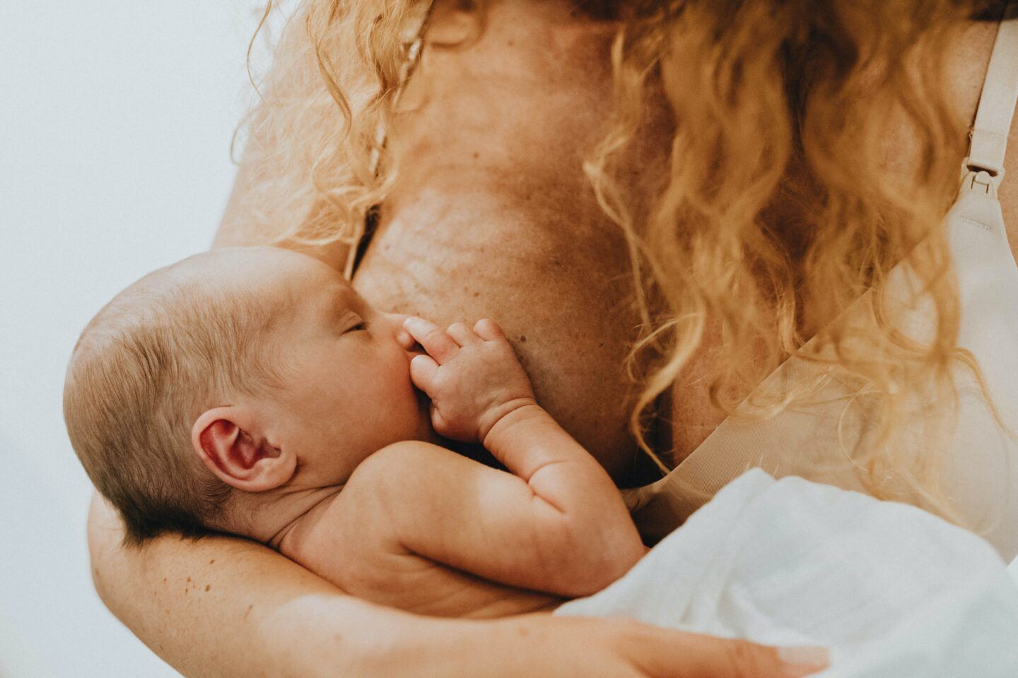 infant microbiome: mother breastfeeding infant