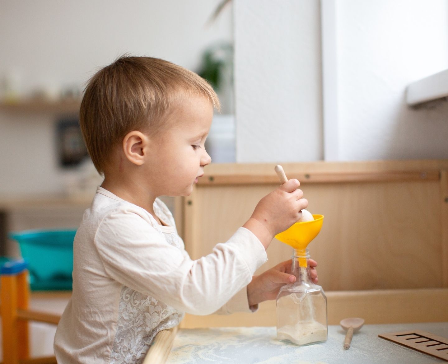 toddler sensory activities with funnel