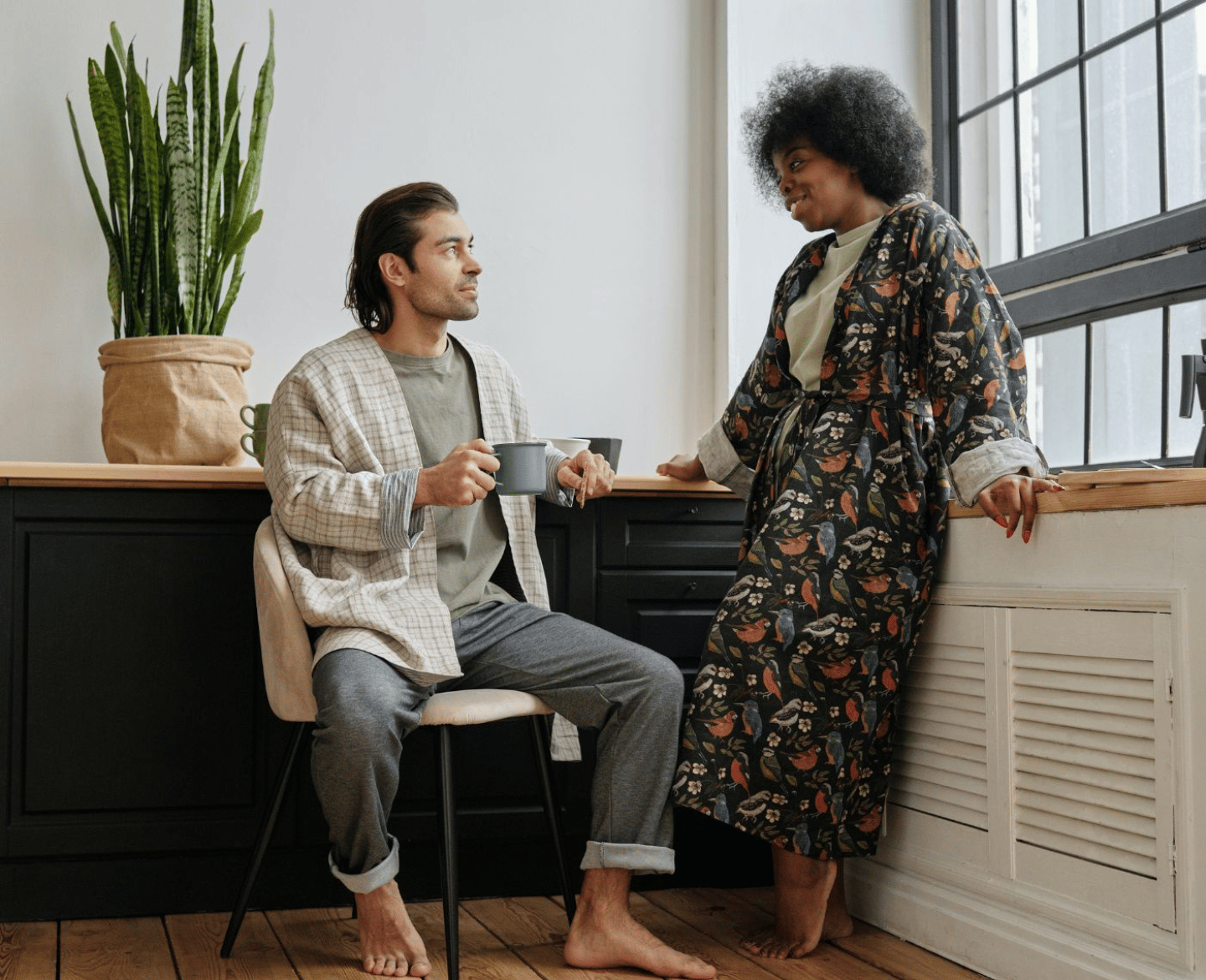 at home sperm testing: man and woman talking over coffee in morning