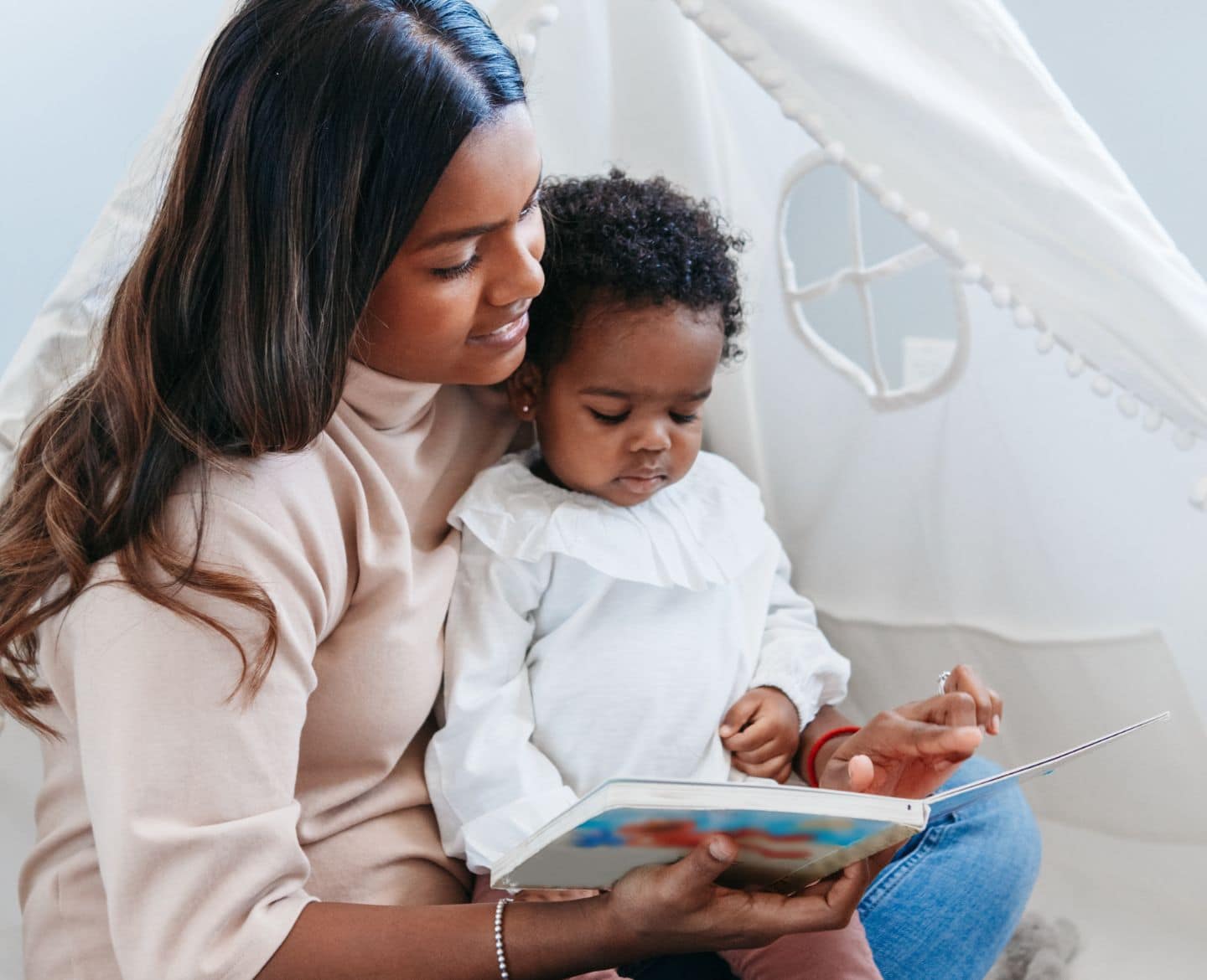 mom reading to baby - best books for 2 year olds