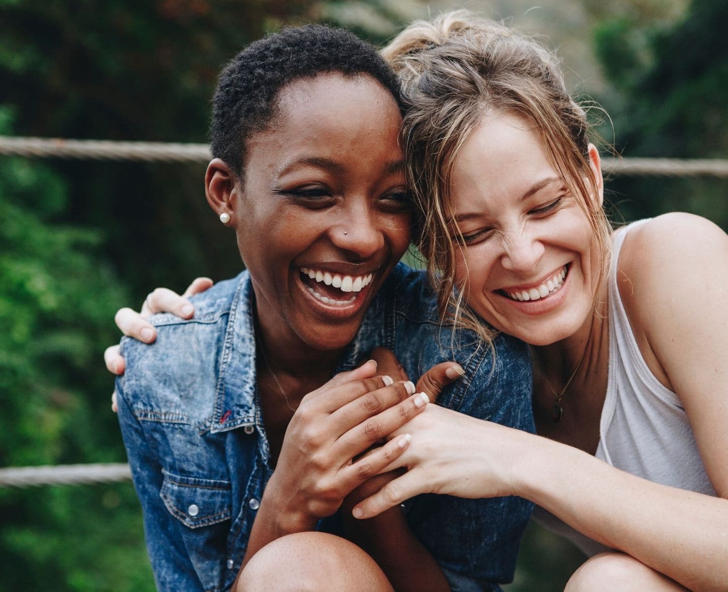 mom friends: two women laughing