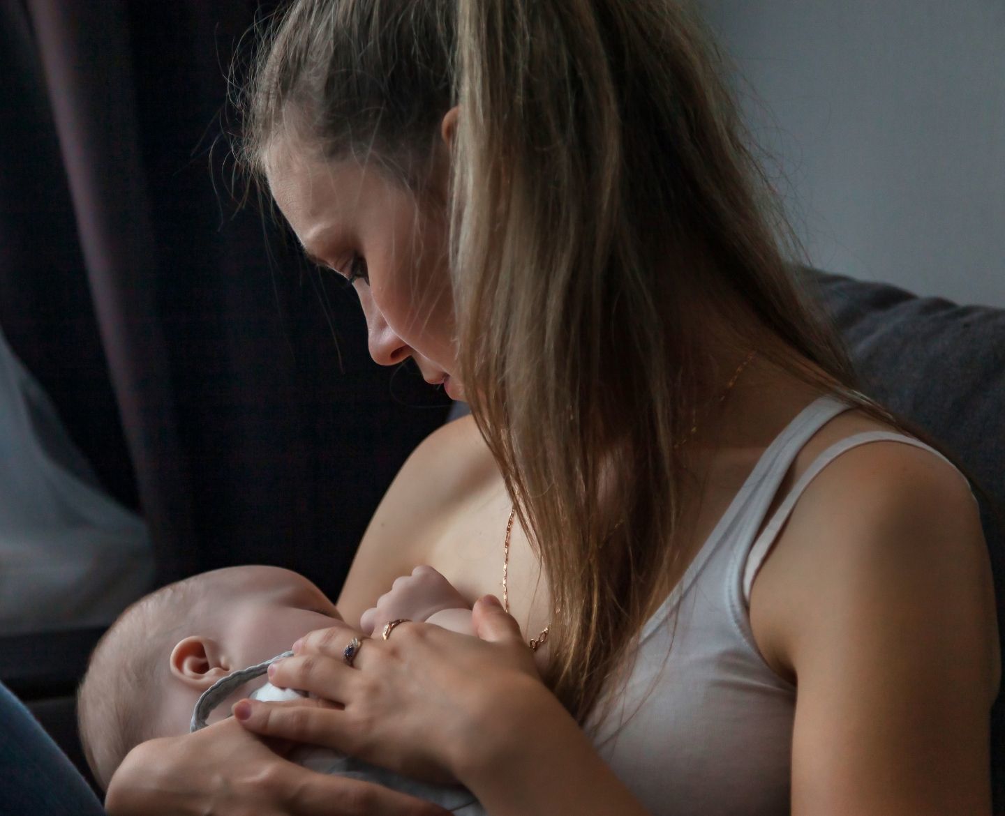 mom breastfeeding baby