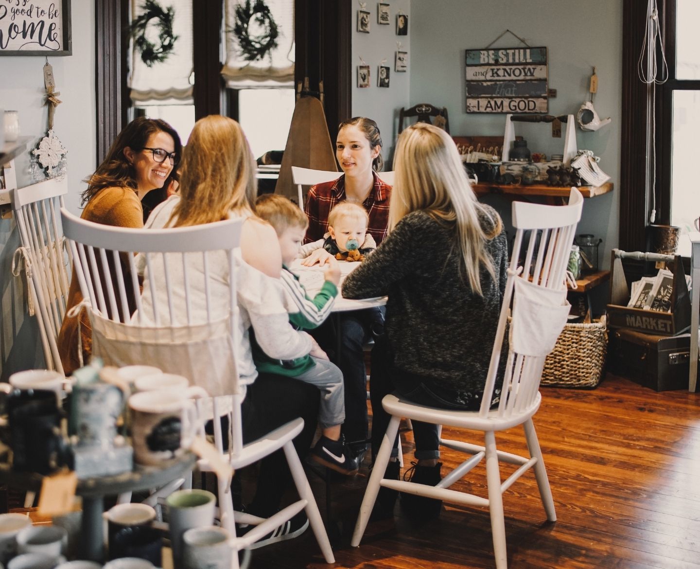 raising kids without a village: group of moms and babies sitting around table