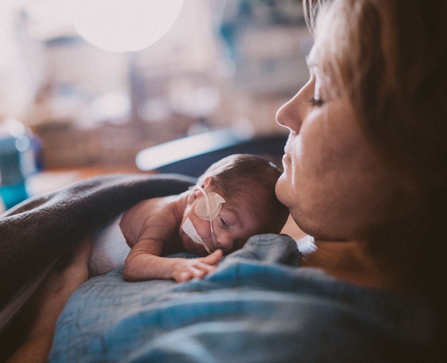 Nicu mom holding baby