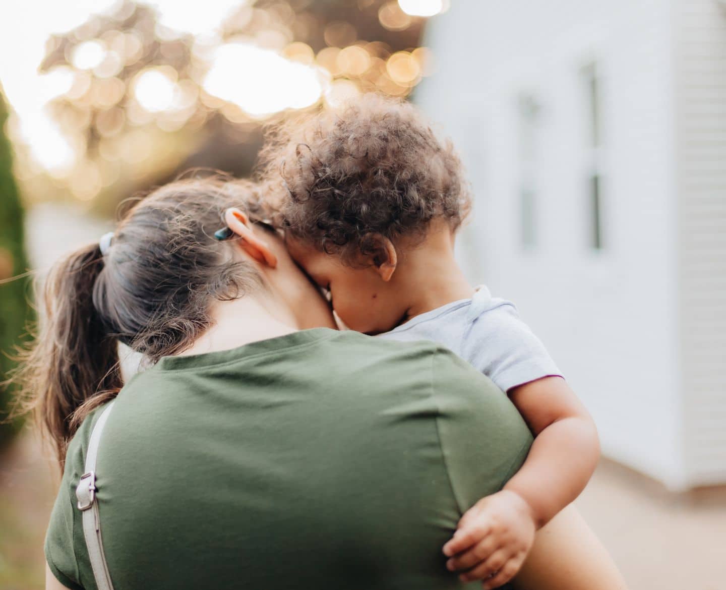 mother holding son