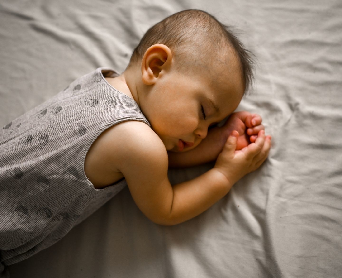 sleeping toddler on mattress