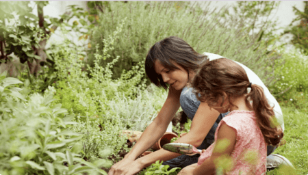 mom and daughter gardening