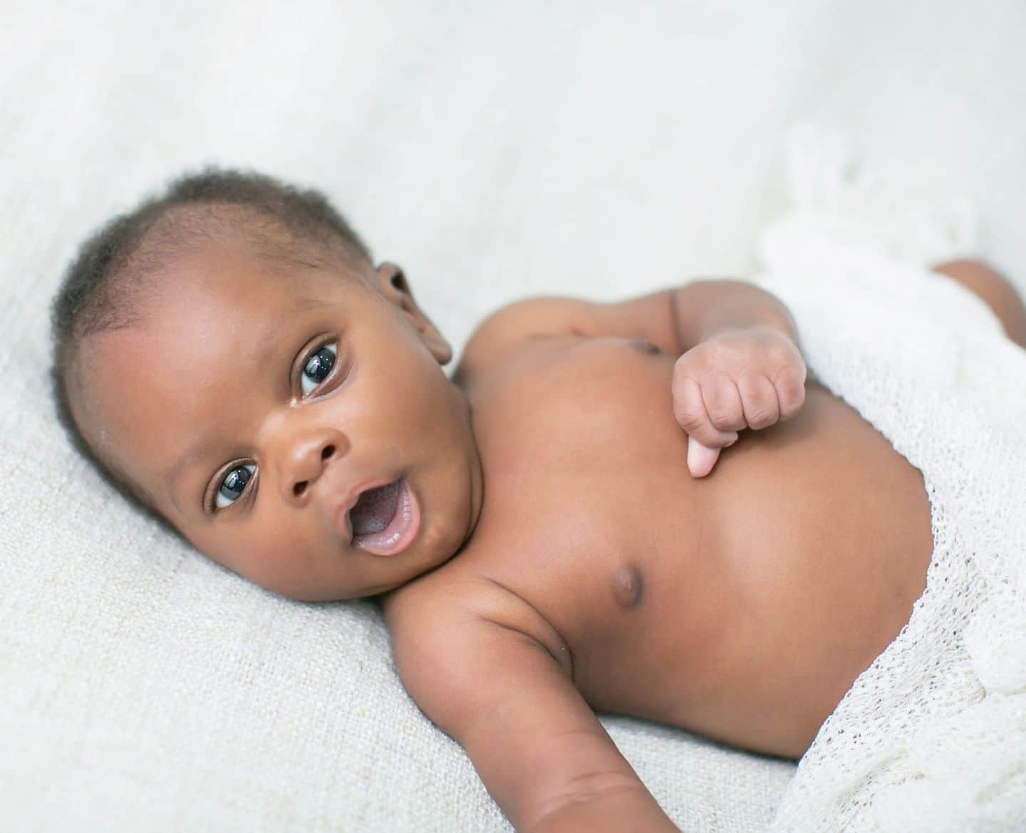 baby names - baby laying on his back