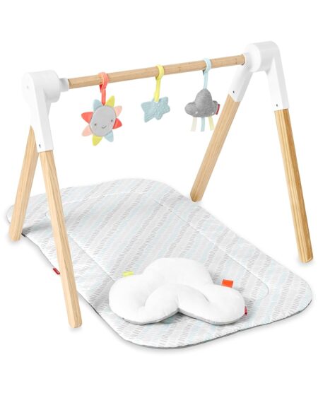 https://www.mother.ly/wp-content/uploads/2022/07/Skip-Hop-Wooden-Baby-Gym-450x563.jpg