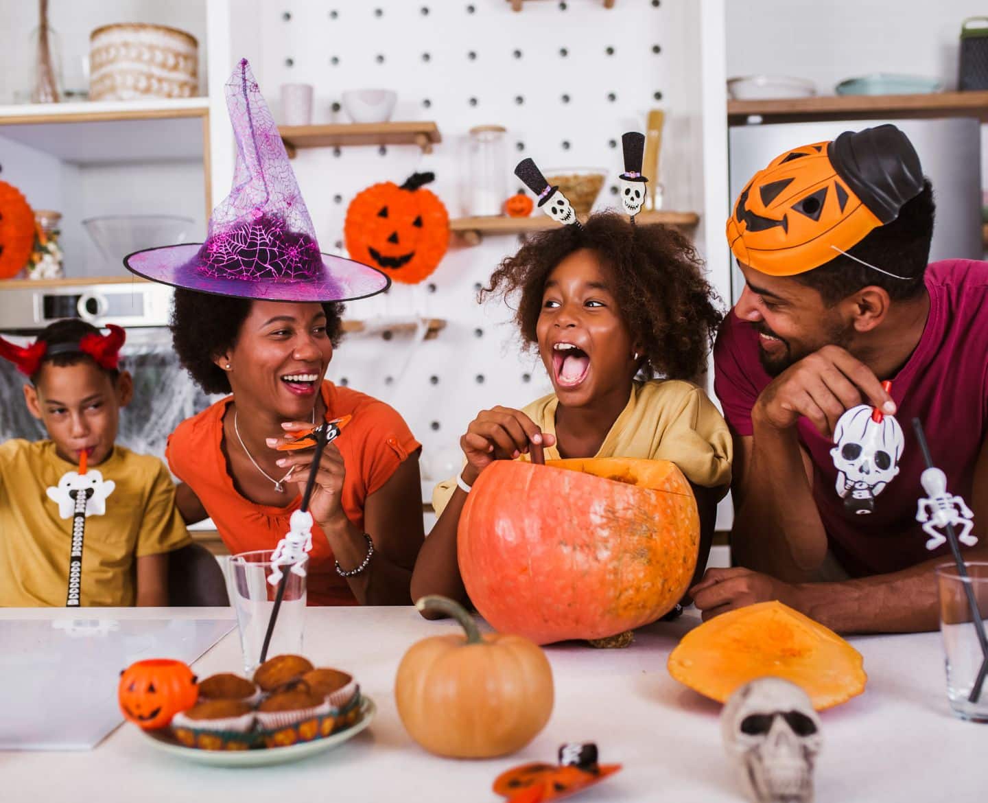 family throwing a halloween party- halloween party ideas