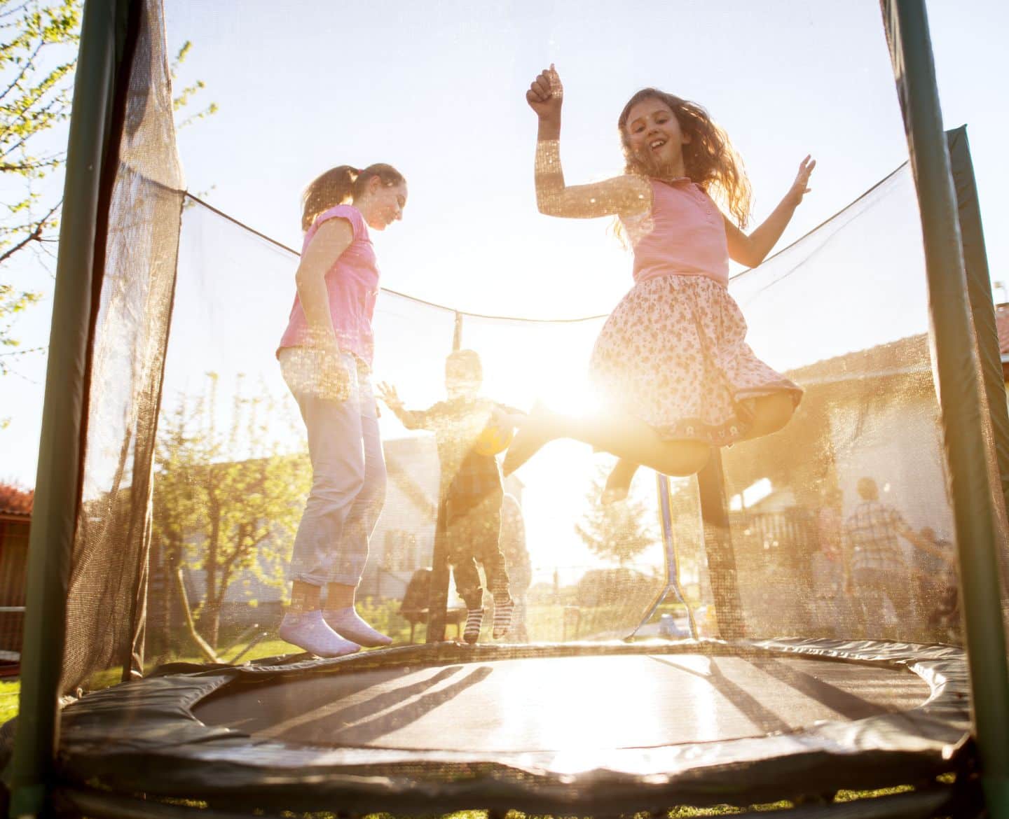 family on trampoline mom saying yes