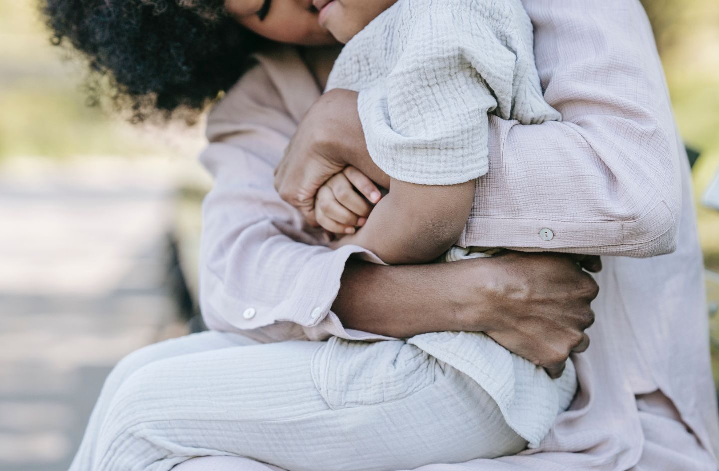 mom holding child