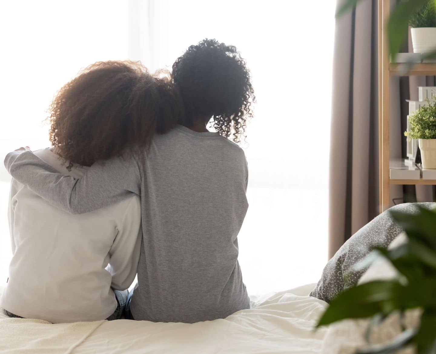 mom hugging daughter - being a mom is hard