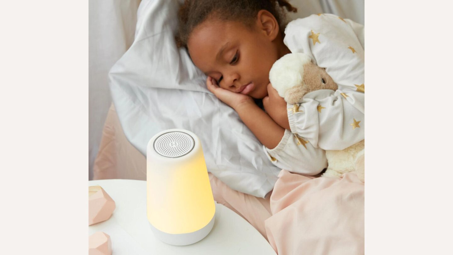 little girl sleeping next to hatch light ok to wake clock