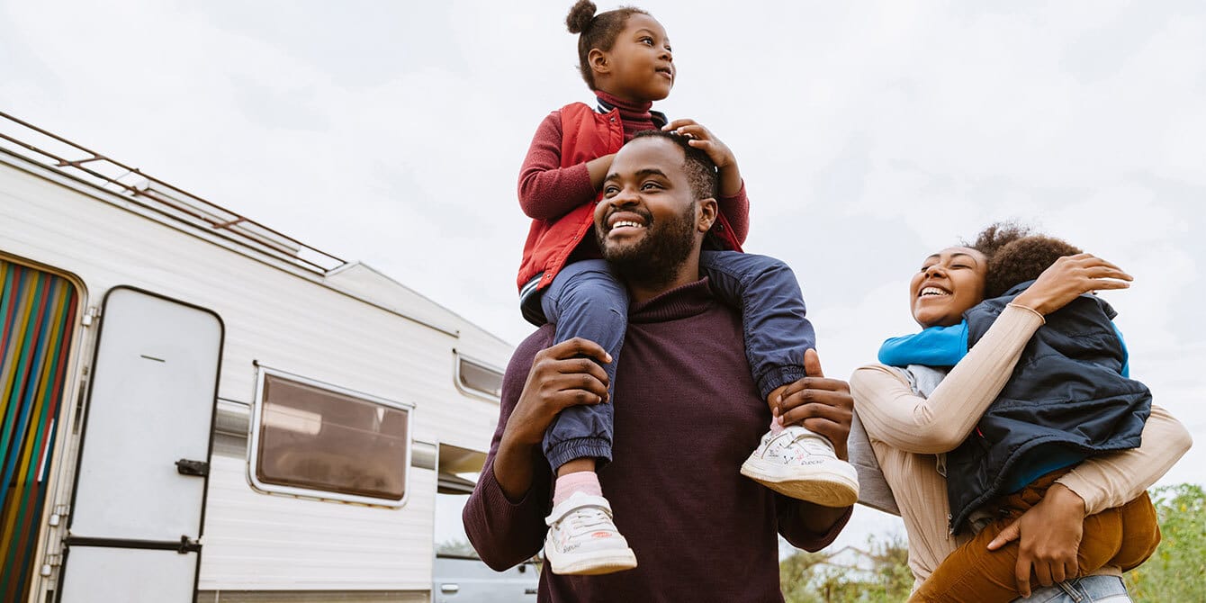 family-in-front-of-a-rv