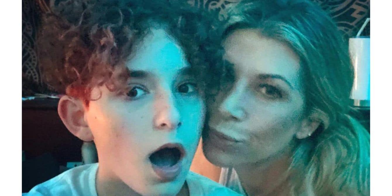 Real Housewives alum Alexis Bellino poses with her transgender son