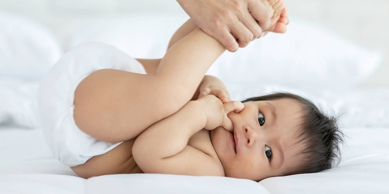 baby getting an infant massage at home