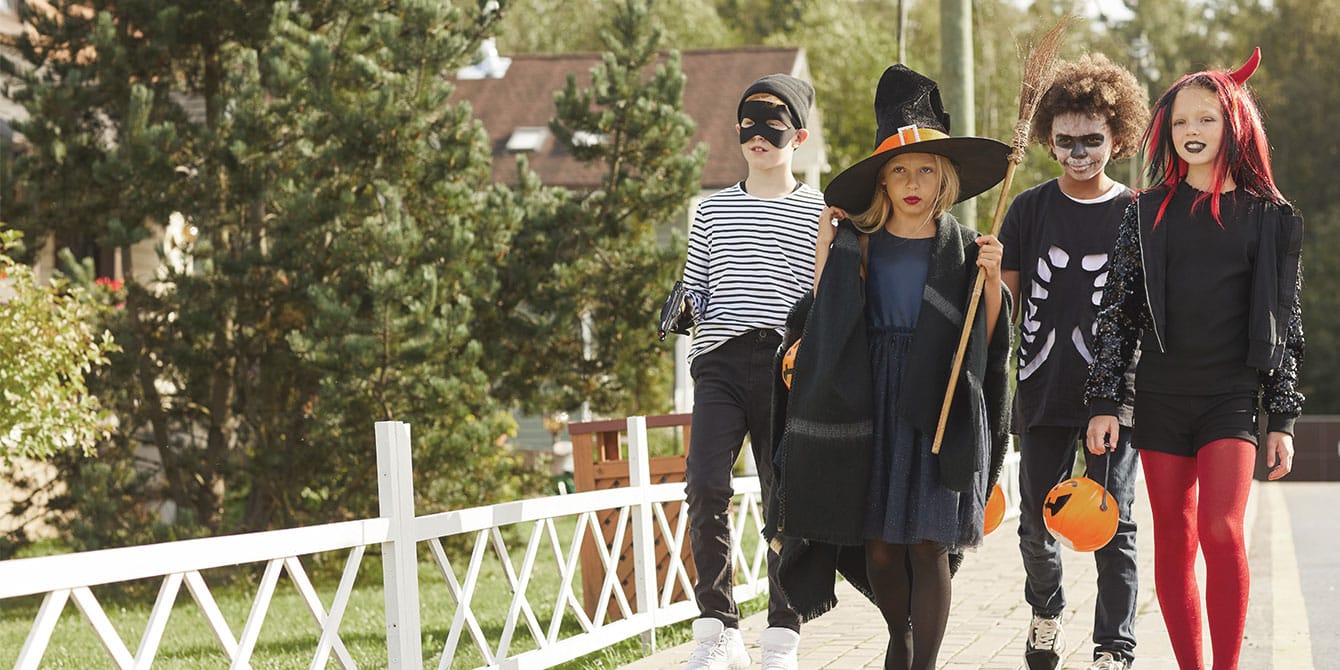 teens trick or treating on halloween