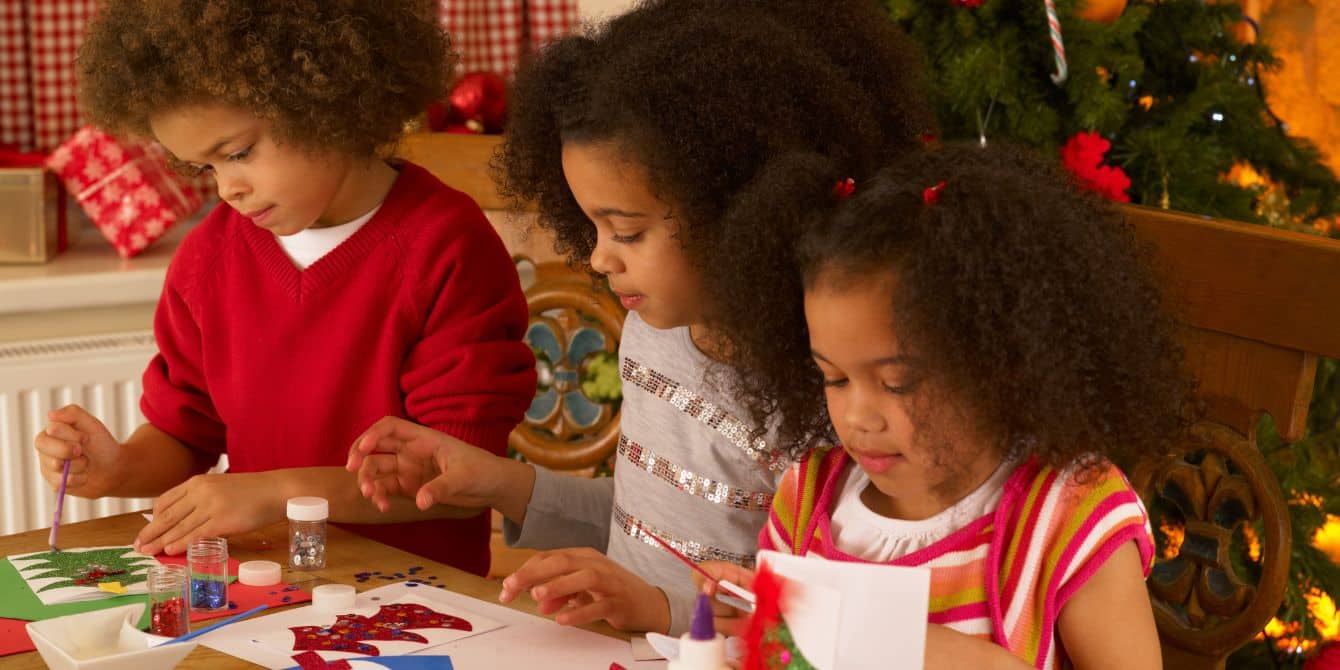 3 kids making christmas cards - christmas crafts for kids