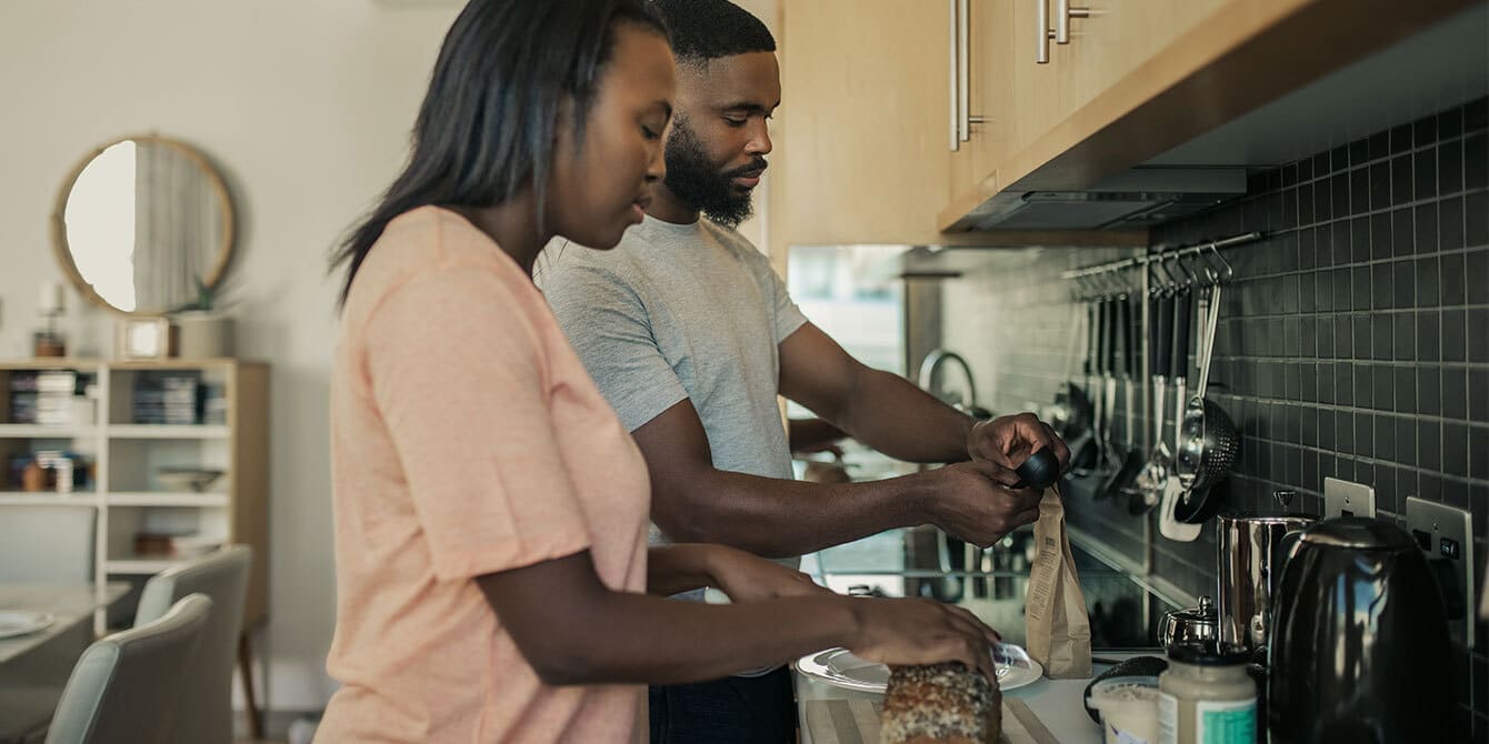 couple standing together making morning - mom burnout