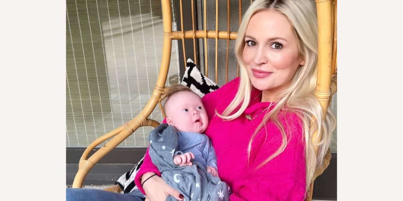 Emily Maynard poses with her infant son