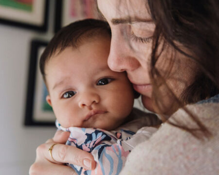 emotional mother with newborn