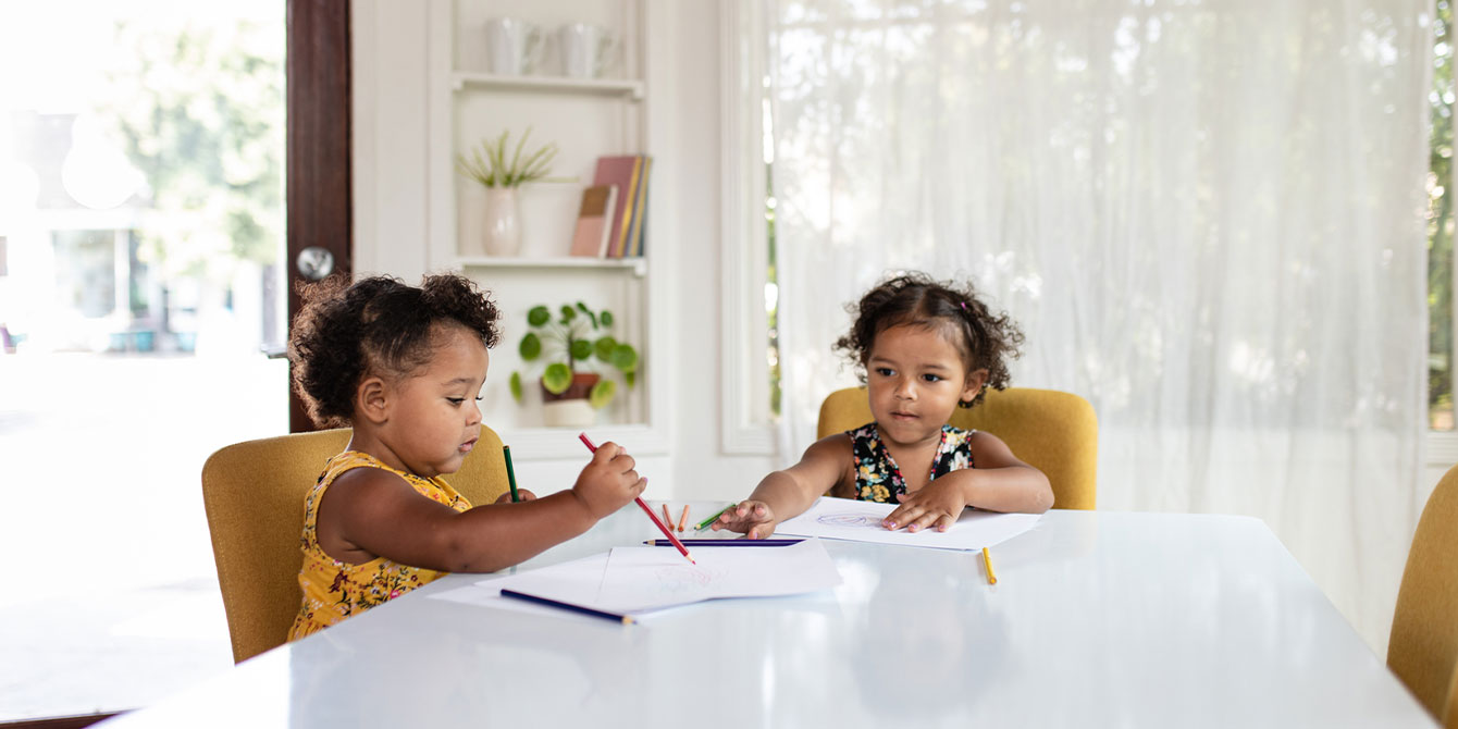 two sisters coloring pages on a table - spider coloring pages