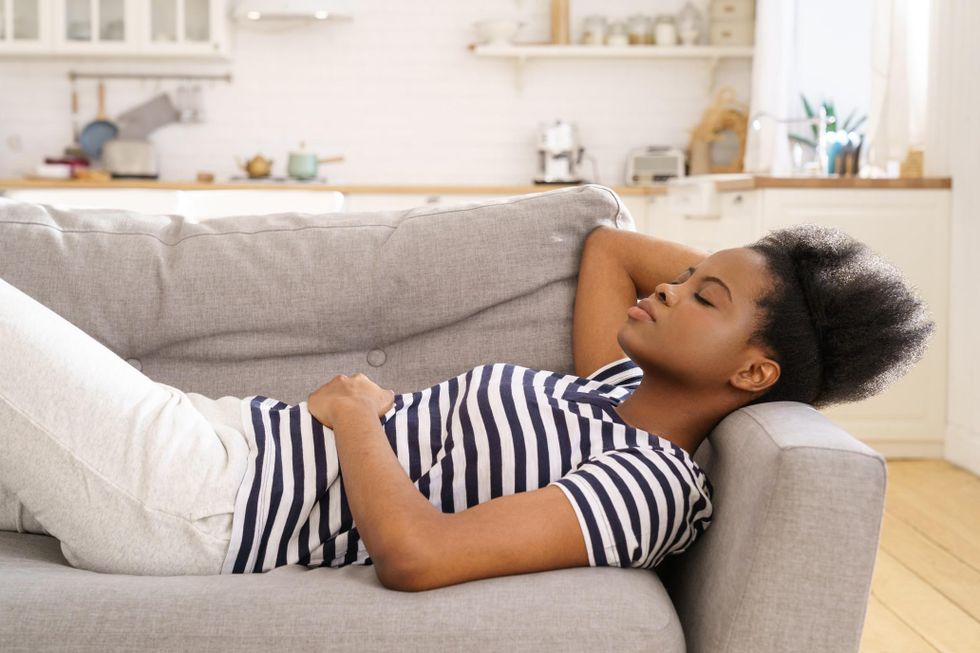 woman sleeping on couch Motherly