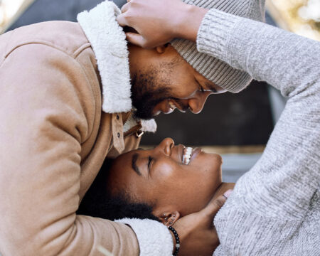 young couple spending quality time together while camping