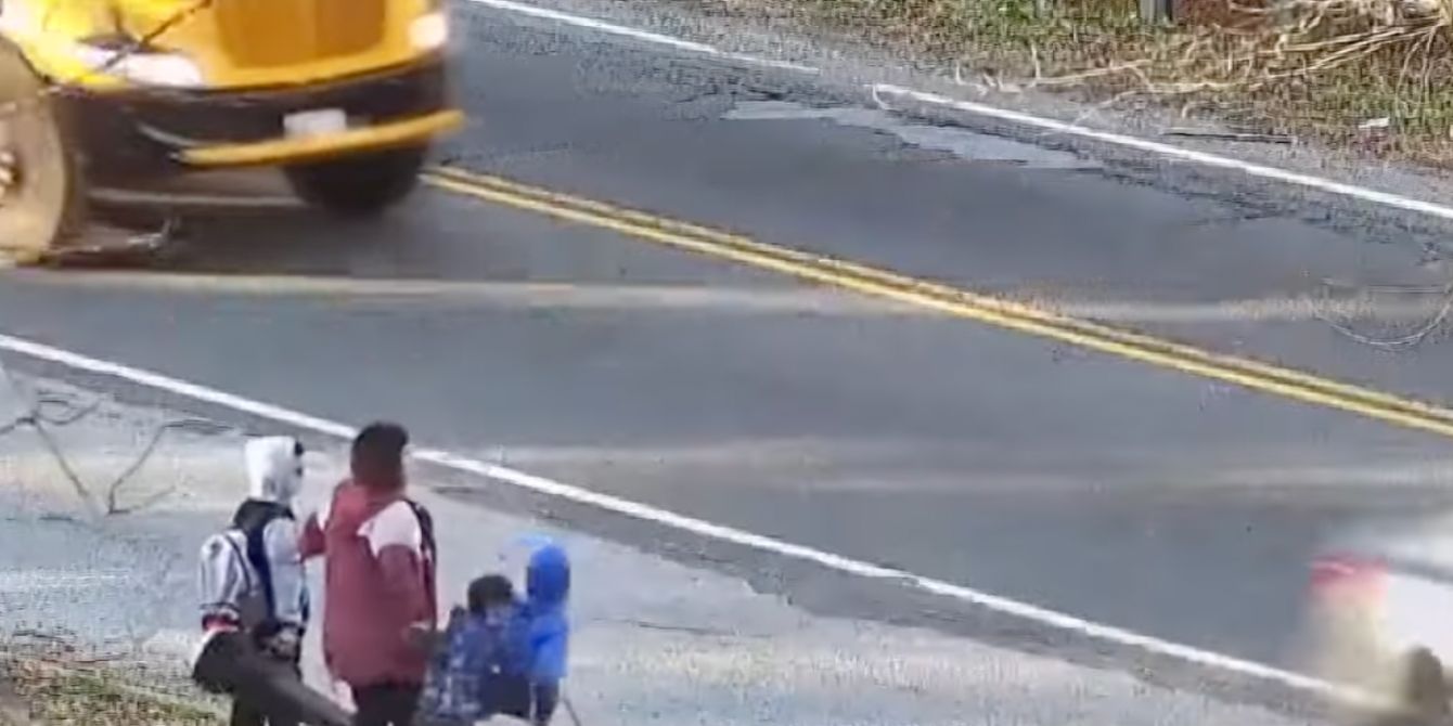 Driver speeds past school bus in viral video