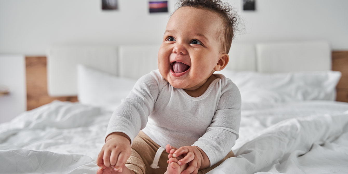 10-month-old baby sitting up in bed - 10-month-old baby weight