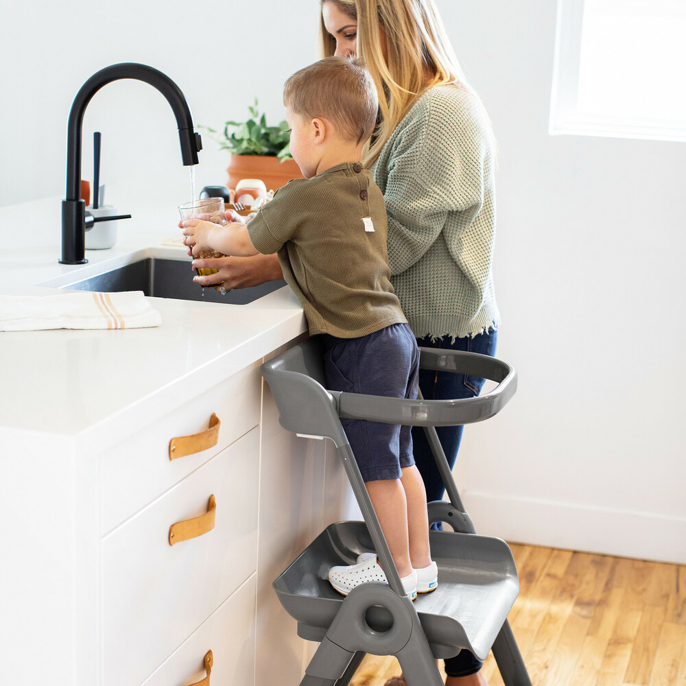 mom and son using the Boon Toddler Learning Tower