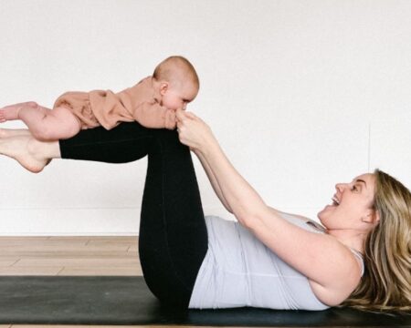 mom and baby doing yoga