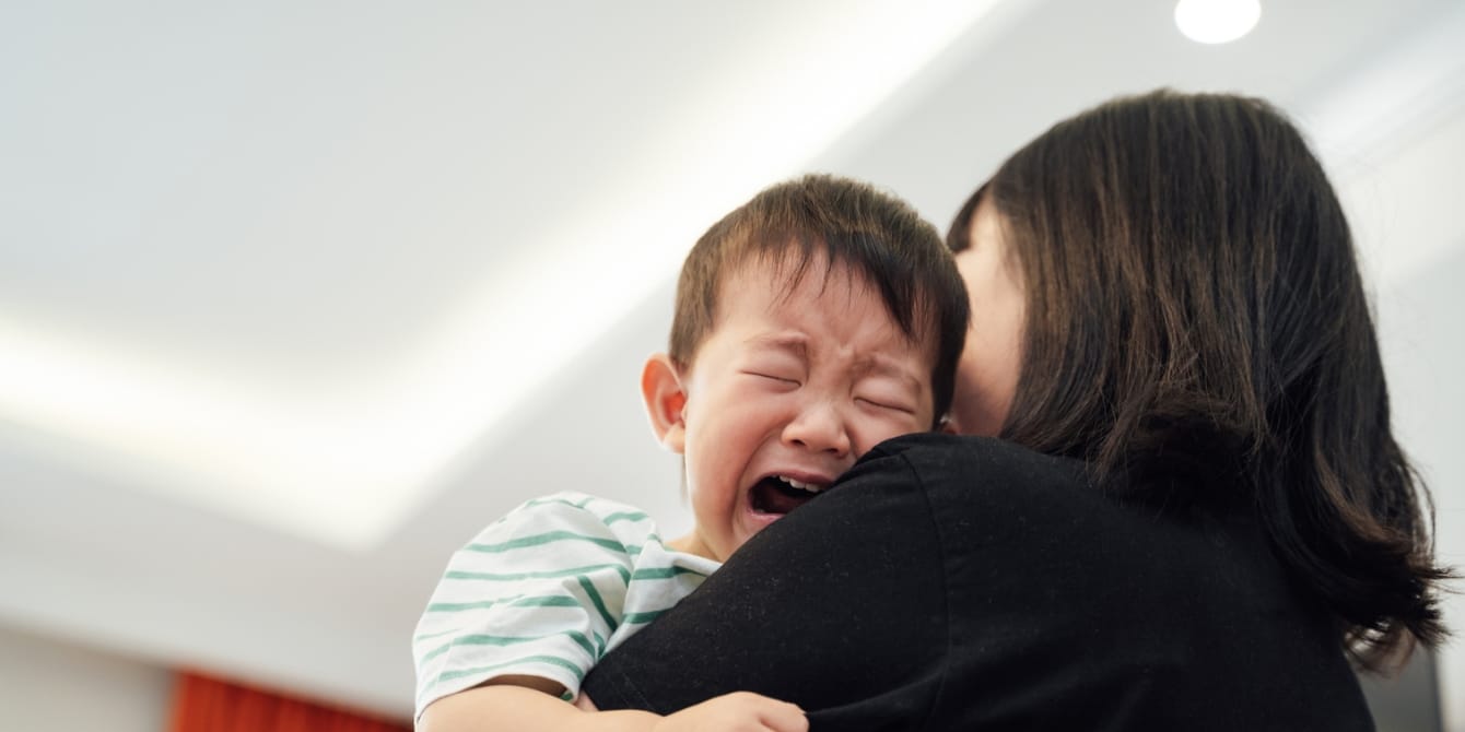 mom whose child is crying - why moms shouldn't apologize for kids