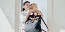 mom hugging daughter going to college Motherly