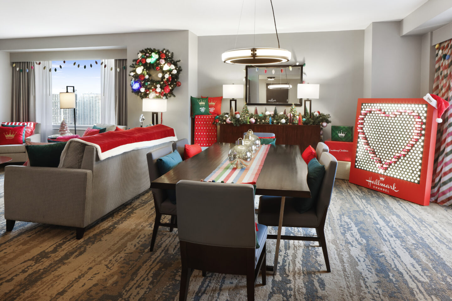 Hilton and Hallmark Channel Haul out the Holly Suite at Hilton Americas Houston Table and Seating Motherly