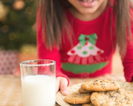 girl leaves milk for santa Motherly