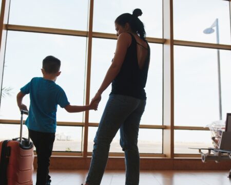 mother and son at the airport traveling with a child with autism