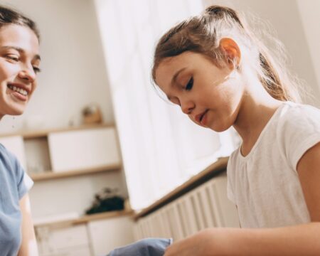 mother talking with daughter after school Motherly