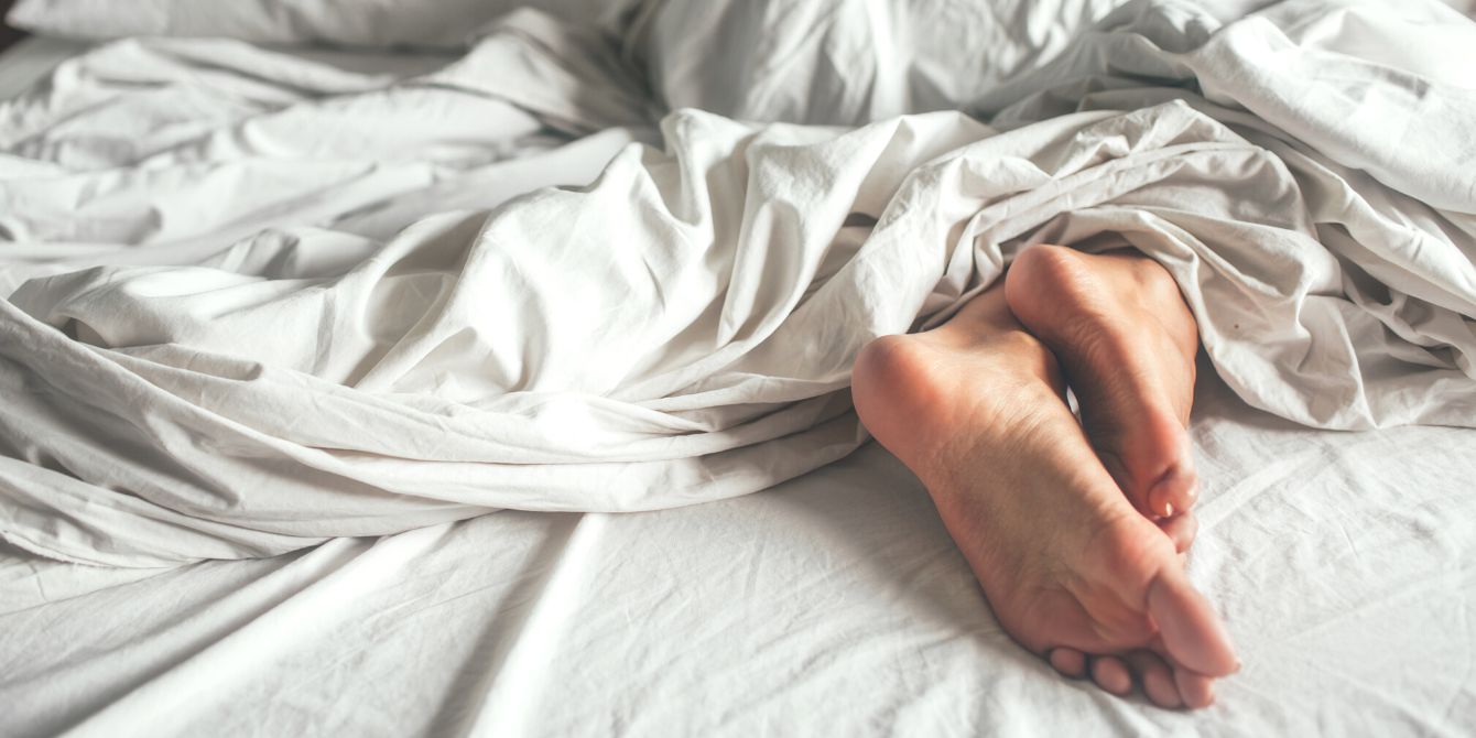 There's A Scientific Reason You Rub Feet Together In Bed - Motherly