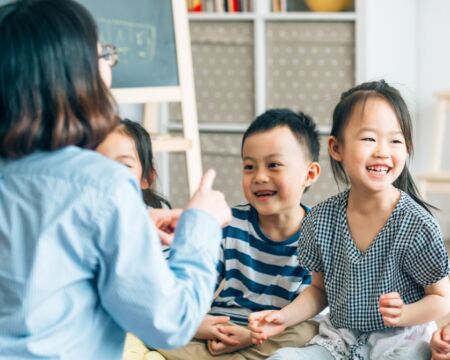 teacher and kids in classroom Motherly