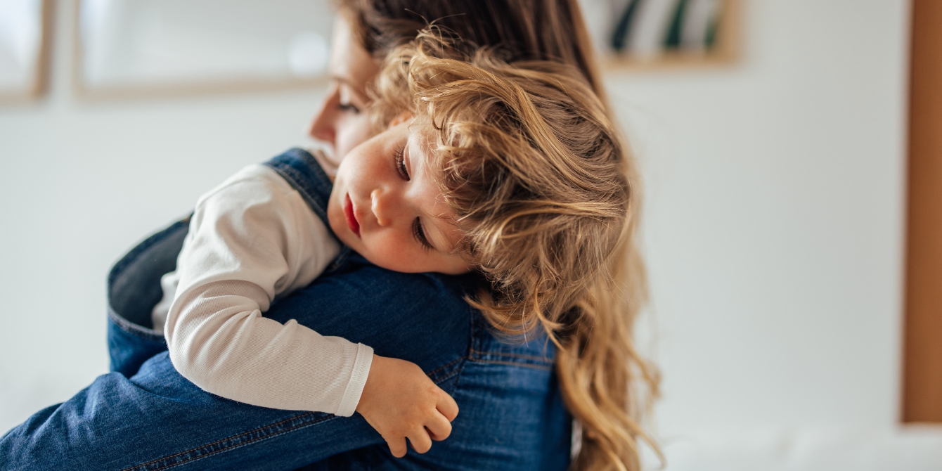 toddler boy hugging his mom Motherly