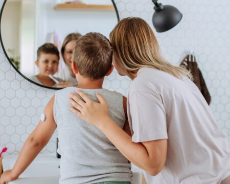 diabetic boy and his mom getting ready in the morning Motherly