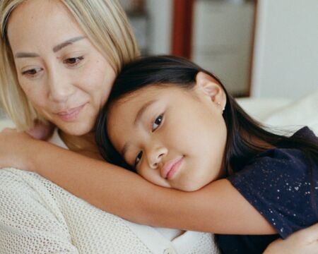 girl hugging her mother Motherly