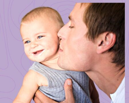 man kissing baby Motherly