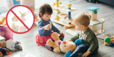 toddles playing- daycares prohibit breast milk