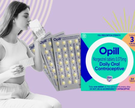 woman taking birth control pill Motherly