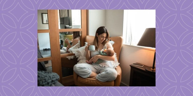 Mom holding baby and drinking hot tea