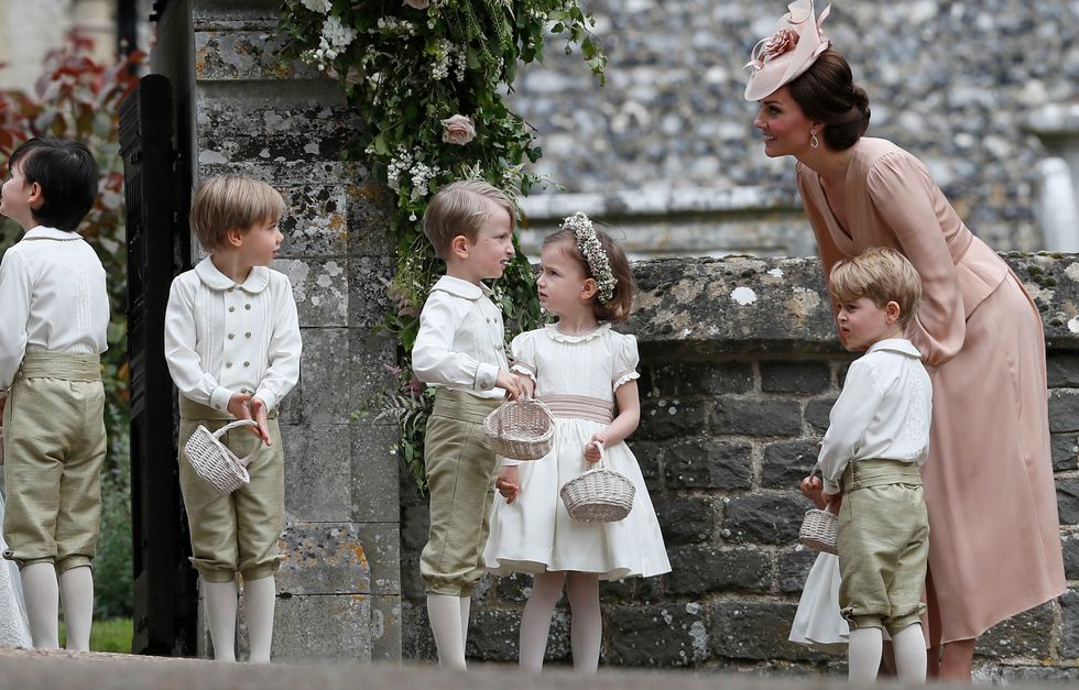 5 photos that prove kate middleton is a mom first royal second 2 Motherly